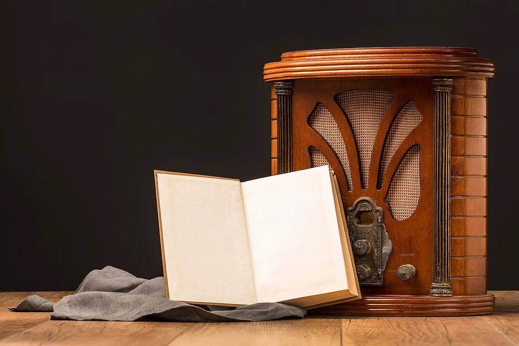 close-up-luxury-retro-radio-buttons-with-open-book